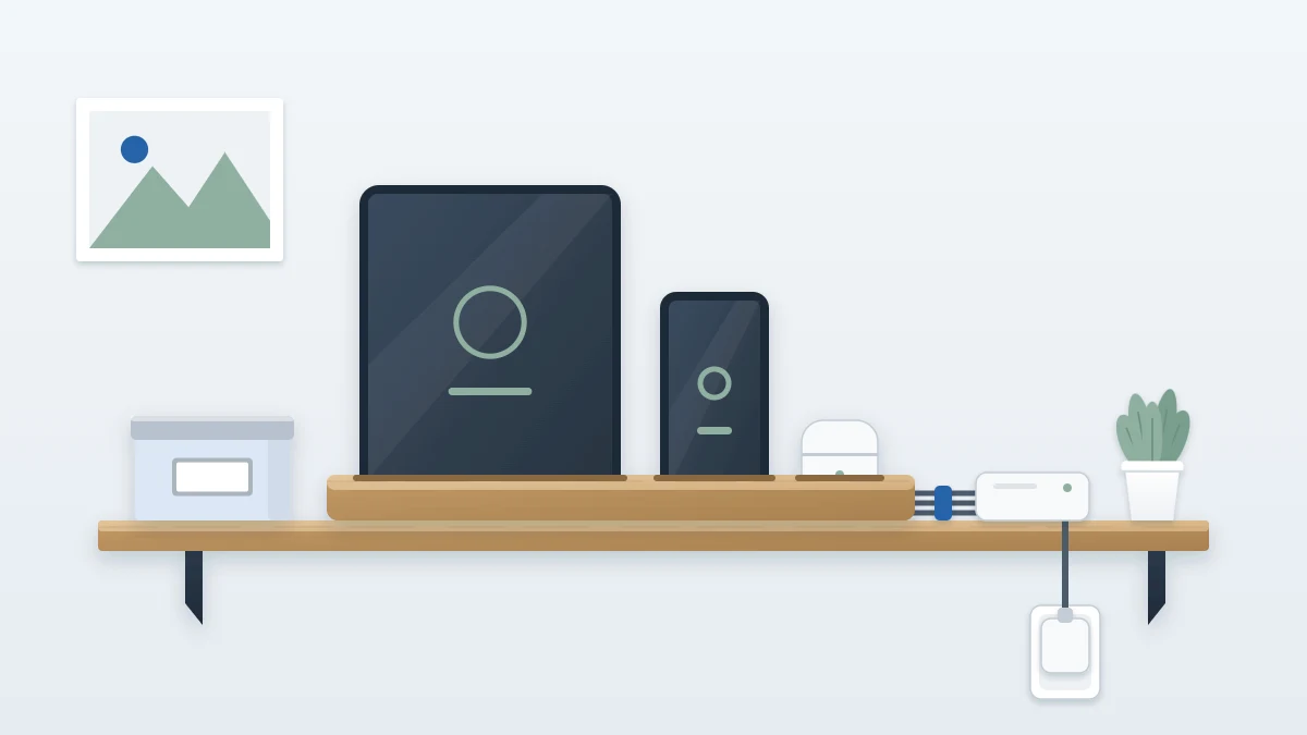 Small shelf with a slotted wooden stand holding a phone, tablet and earbud case upright, short cables behind and a small lidded box beside