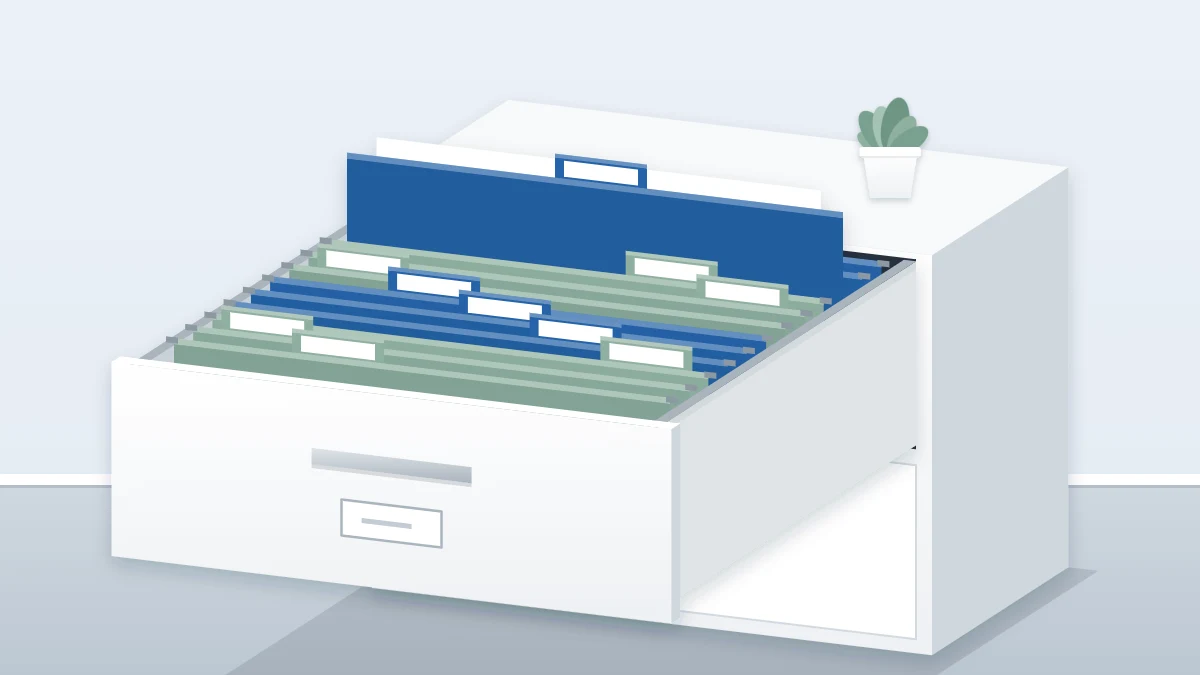 Open file drawer at an angle with hanging folders in two colors, staggered blank tabs and one folder lifted slightly