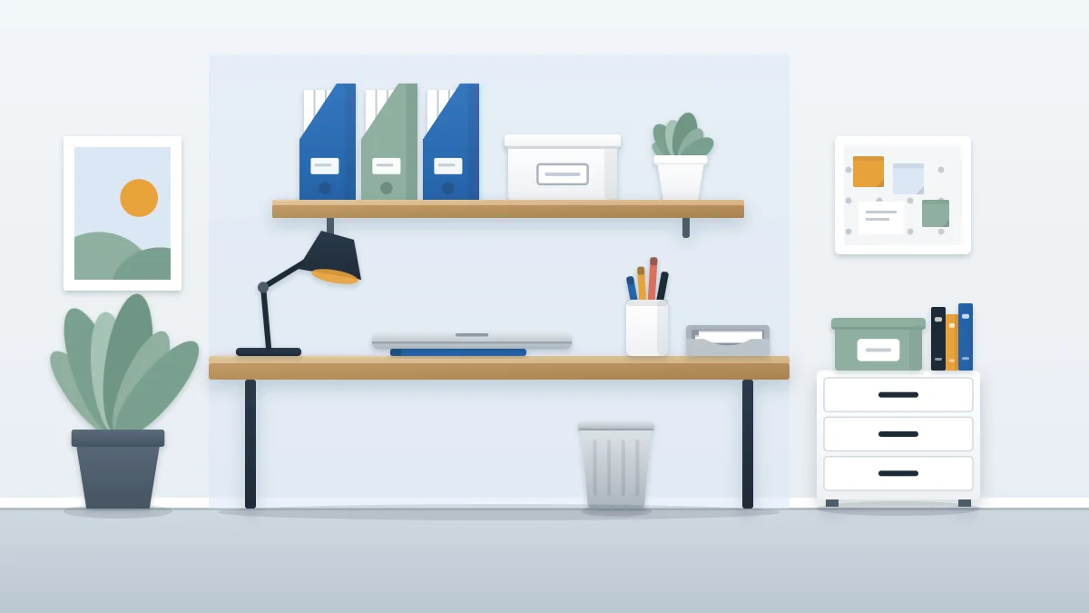 Tidy home office with a pale wood desk, closed laptop, lamp, pen cup, shelf of file boxes and a drawer unit
