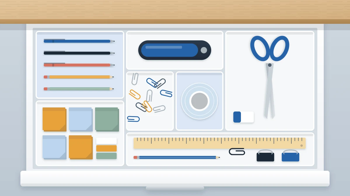 Open desk drawer from above with compartments holding pens, stapler, sticky notes, paper clips, scissors, ruler and tape