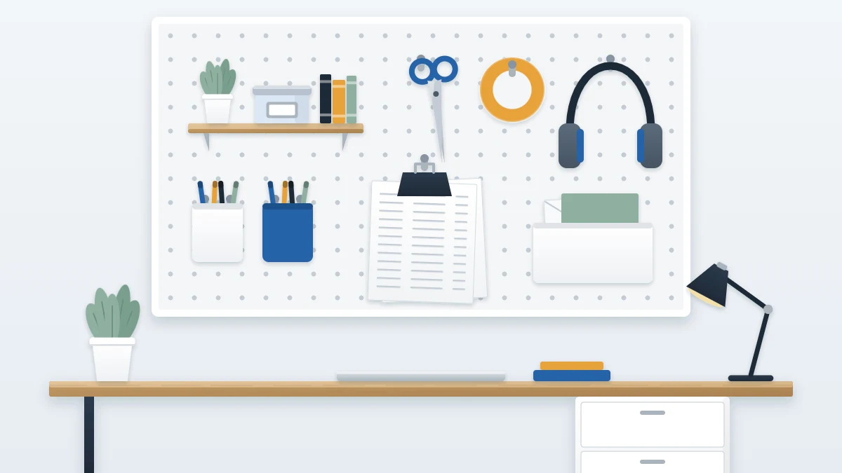 Pegboard above a desk with a small shelf, three hooks holding scissors, tape and headphones, two hanging pen cups and a clip with papers