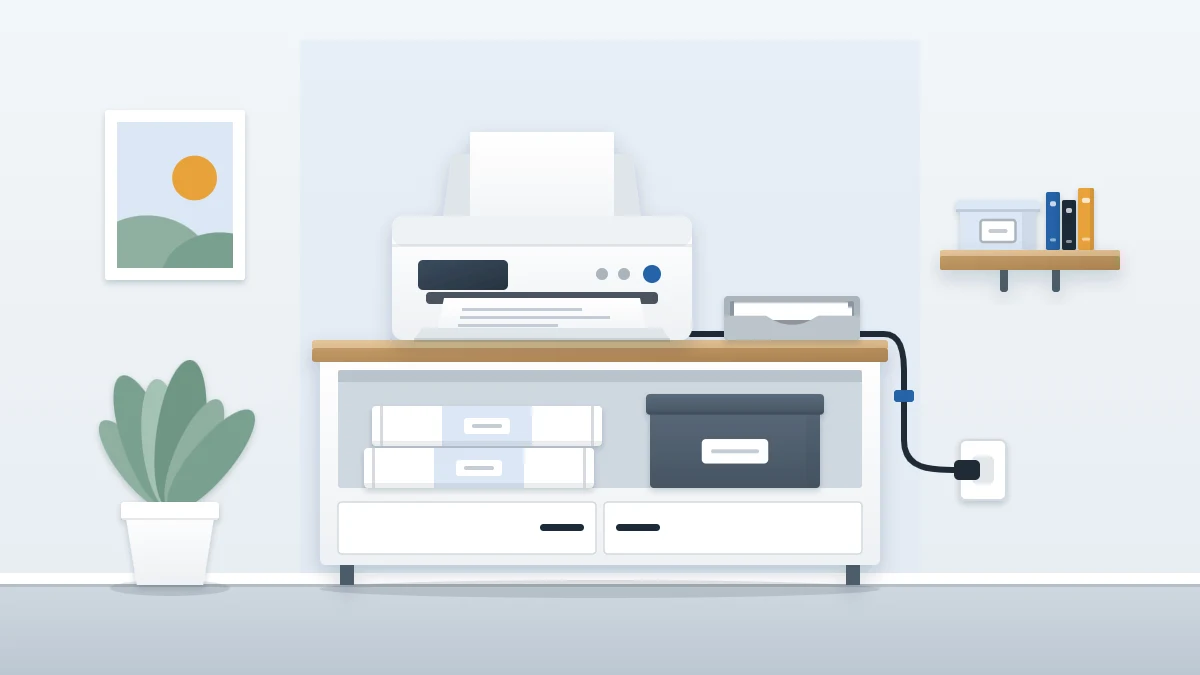 Low cabinet with a printer on top, a sheet in its output tray, two reams of paper and a lidded box on the shelf below